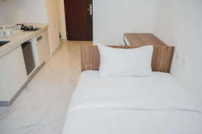 Nice and Elegant Studio Apartment at Sky House BSD near AEON Mall By Travelio